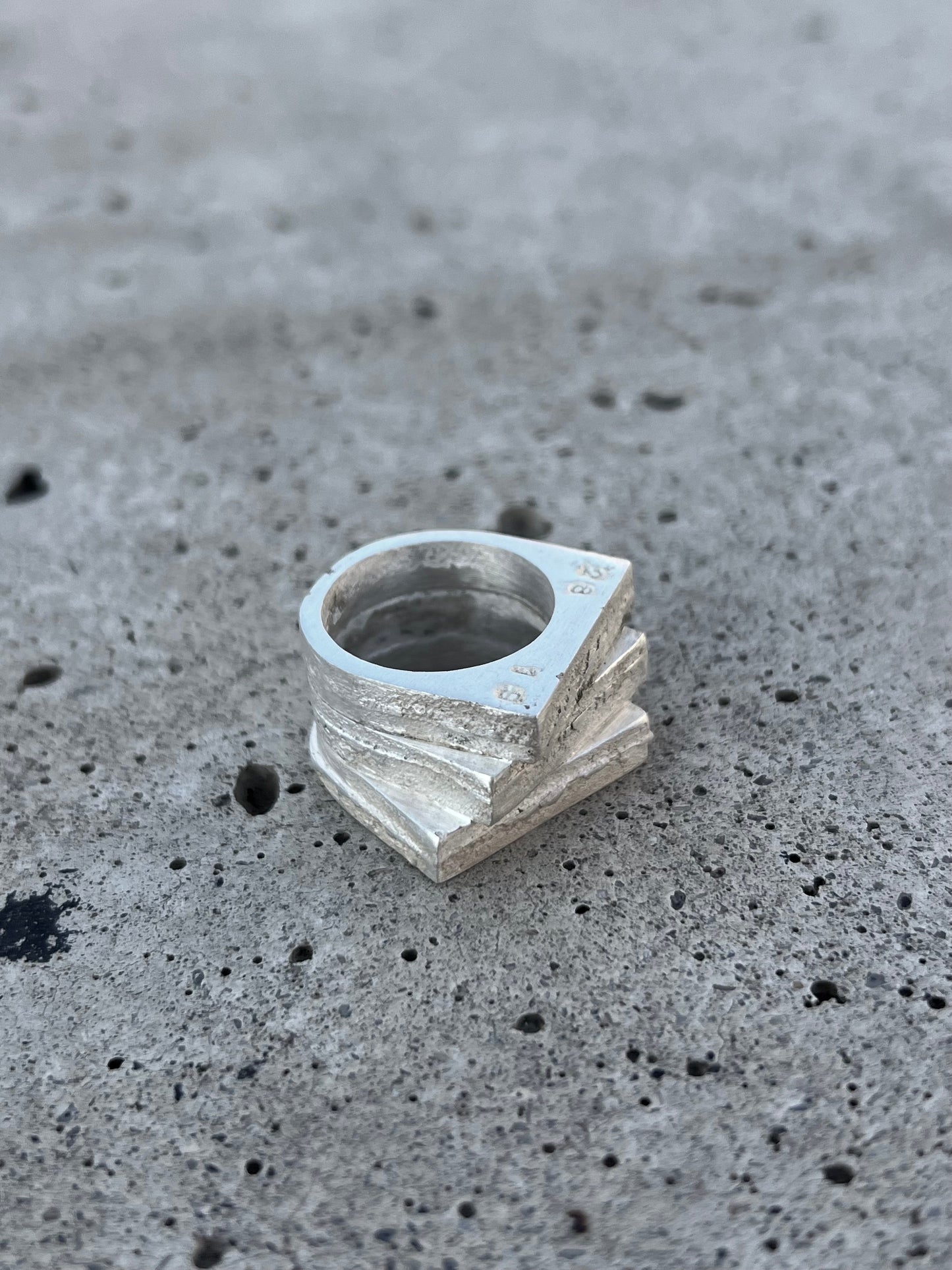 Solid silver ring with raw brutalist texture, one-of-a-kind design