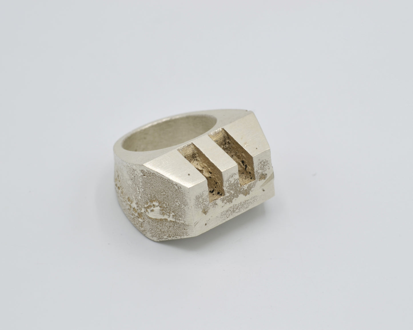 Monumental statement ring handmade from solid sterling silver. avant-garde aesthetics and brutalist design.
