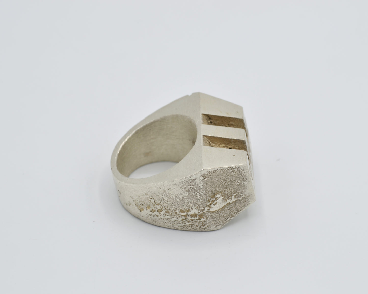 Monumental statement ring handmade from solid sterling silver. avant-garde aesthetics and brutalist design.