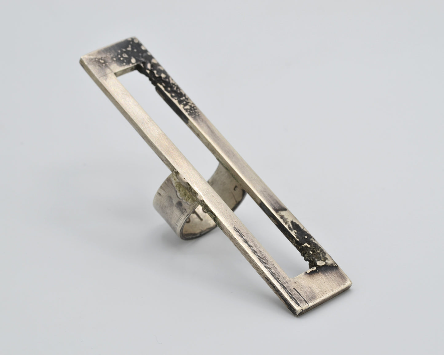 One-of-a-kind statement ring that reaches vertically over the finger, handcrafted from sterling silver
