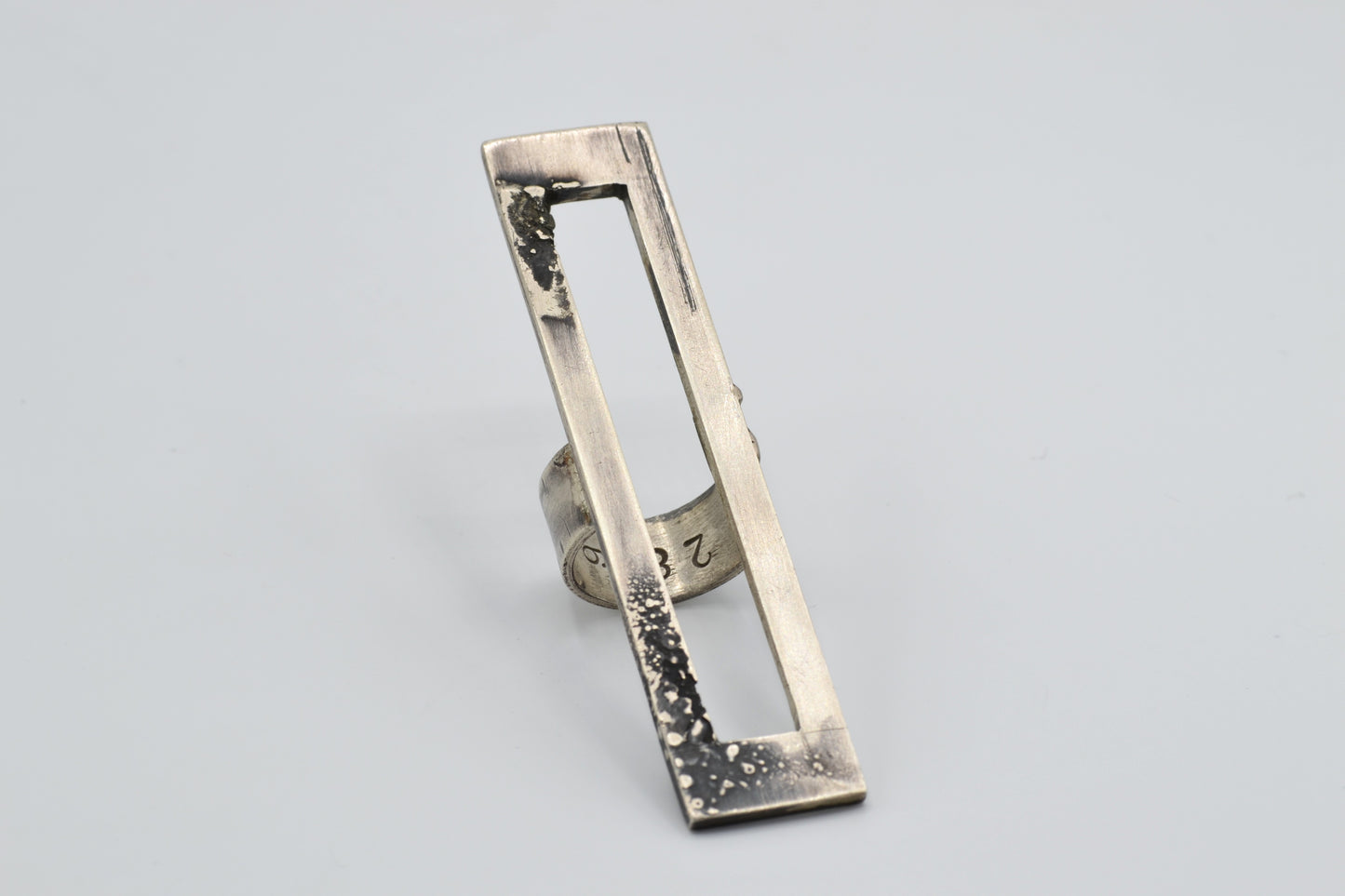 One-of-a-kind statement ring that reaches vertically over the finger, handcrafted from sterling silver