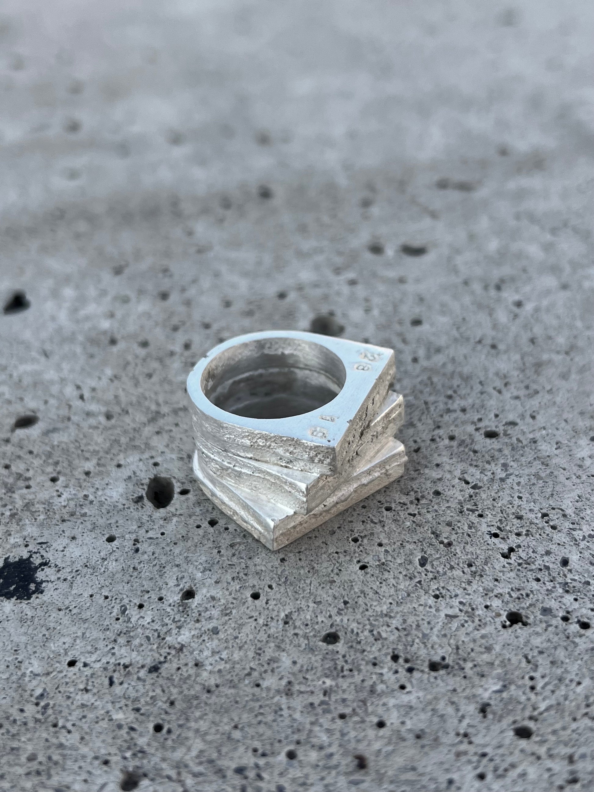 Solid silver ring with raw brutalist texture, one-of-a-kind design