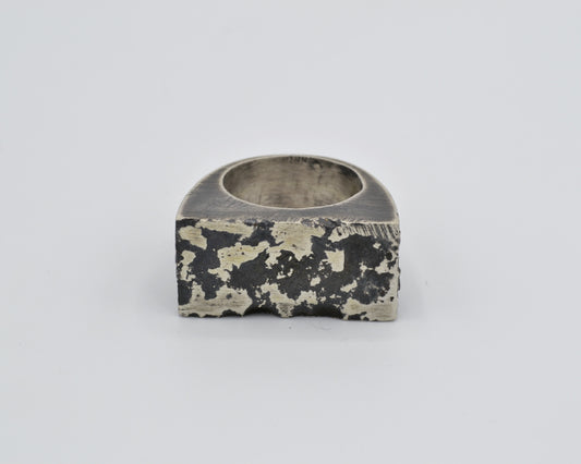 chunky silver ring with oxidized texture, made using sand casting technique