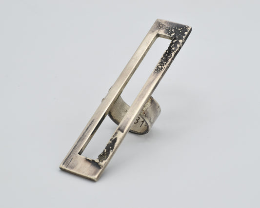 One-of-a-kind statement ring that reaches vertically over the finger, handcrafted from sterling silver