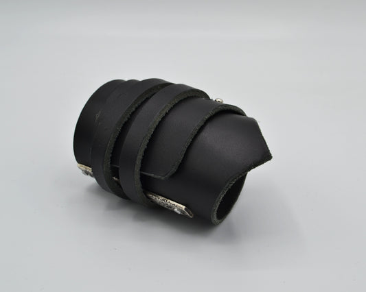 avantgarde, dark aesthetic leather bracelet with signature sterling silver plate mounted at the side.